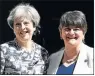  ?? Picture: REUTERS ?? SEALING THE DEAL: Theresa May, left, with Arlene Foster, outside 10 Downing Street