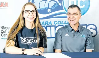  ?? SUPPLIED PHOTO ?? Three-time Thorold Secondary School athlete of the year Hannah Baker, left, signs a letter of intent to play basketball at Niagara College while Knights head coach Mike Beccaria looks on.