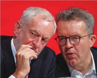  ?? - Reuters ?? ANNUAL CONFERENCE: Britain’s Labour Party Leader Jeremy Corbyn and Deputy Leader of the Labour Party Tom Watson sit together on stage at the annual Labour Party Conference in Liverpool, Britain, September 23, 2018.