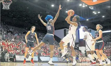  ?? TONY AVELAR — THE ASSOCIATED PRESS ?? Stanford’s Kiana Williams (23) shoots over Gonzaga’s Zykera Rice (00) during the Cardinal’s first-round NCAA win.