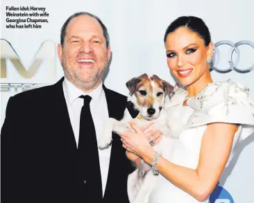  ??  ?? Fallen idol: Harvey Weinstein with wife Georgina Chapman, who has left him