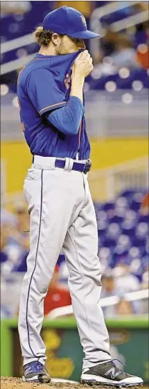  ?? PHOTO BY AP ?? Mets continue to be let down by their bullpen as Erik Goeddel gives up four runs in the eighth inning of Wednesday’s loss to Marlins.