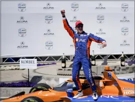  ?? RYAN SUN — THE ASSOCIATED PRESS ?? Chip Ganassi Racing driver Scott Dixon celebrates his victory during the Indycar Grand Prix of Long Beach race on Sunday in Long Beach, Calif.