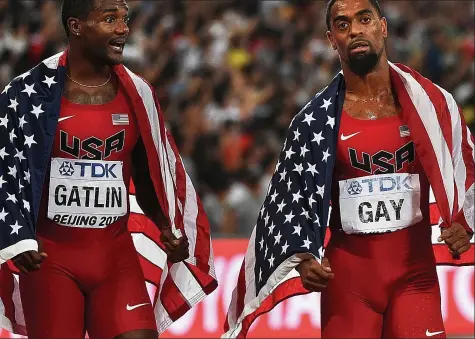  ?? GETTY IMAGES ?? Tainted: Gatlin and Gay compete at last year’s World Championsh­ips after serving drugs bans