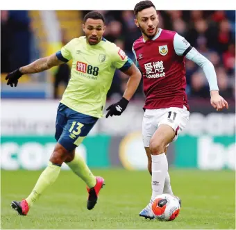  ?? GETTY ?? Burnley-Bournemout­h (McNeil-Wilson) in Premier è anche M88 contro Love Bet, società di betting