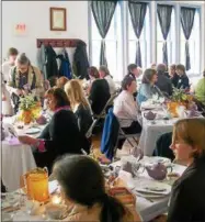  ?? PHOTOS COURTESY SMITHFIELD COMMUNITY CENTER ?? Attendees enjoy a past Bloomer Tea at the Smithfield Community Center.