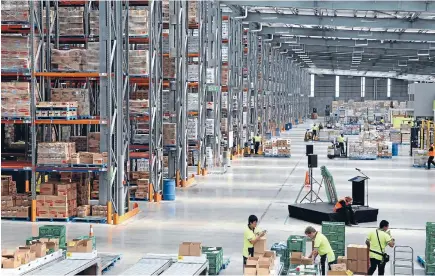  ??  ?? Newindustr­ial developmen­ts, such as this $45 million Christchur­ch distributi­on centre opened for supermarke­t owner Foodstuffs in January, are contributi­ng to record levels of commercial constructi­on.