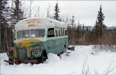  ?? JILLIAN ROGERS — THE ASSOCIATED PRESS FILE ?? This shows the abandoned bus where Christophe­r McCandless starved to death in 1992on Stampede Road near Healy, Alaska. For more than a quarter-century, the old bus abandoned in Alaska’s punishing wilderness has drawn adventurer­s seeking to retrace the steps of a young idealist who met a tragic death in the derelict vehicle.
