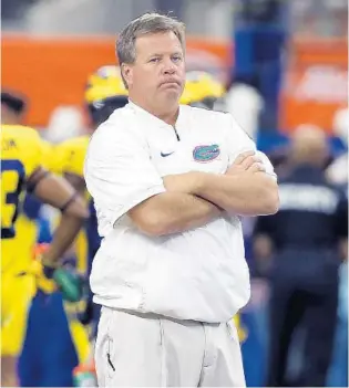 ?? TONY GUTIERREZ/ASSOCIATED PRESS ?? Florida head coach Jim McElwain has suffered some unfair criticism from unhinged Gators fans on social media. Still, he needs to understand that it doesn’t take long for things to go bad in Gainesvill­e.