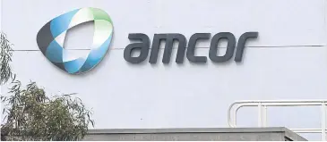  ?? AFP ?? A sign of Australian packaging group Amcor Ltd is seen outside one of its packaging facilities in Melbourne.