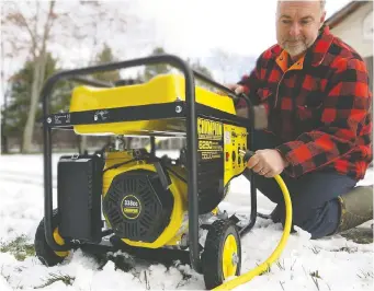  ?? ROBERT MAxwELL ?? Owning a generator is one thing, but connecting that generator to the wiring of your home is another. The yellow cable shown here delivers generator power to all the circuits of a home.