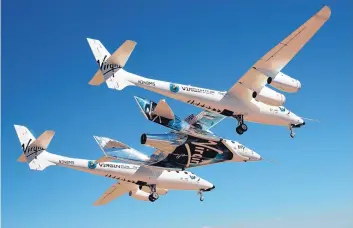  ?? COURTESY OF VIRGIN GALACTI ?? Virgin Mothership Eve carries Virgin Spaceship Unity for its first flight ever over Mojave, Calif., in 2016. Virgin Galactic has announced plans to become the first human spacefligh­t company to go public.