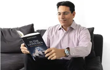  ?? (Courtesy Danny Danon) ?? DANNY DANON and his new book, ‘In the Lion’s Den.’ ‘The world of diplomacy and foreign policy makes for interestin­g friendship­s.’