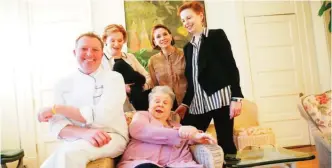  ??  ?? In this photo, Ella Brennan, center, laughs as she poses for a photo with daughter Ti Adelaide Martin, right, Lally Brennan, sister Dottie Brennan, second left, and Commander’s Palace executive chef Tory McPhail, left, at her home adjacent to the restaurant in New Orleans.—AP