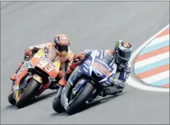  ?? PICTURE: EPA ?? Jorge Lorenzo (right) of Spain and Marc Marquez battled for the lead before Lorenzo opened an uncatchabl­e lead.