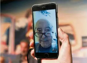  ??  ?? Director Godard is seen on a screen as he speaks via video conference about his film The Image Book at the Cannes Film Festival. — Reuters