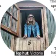  ??  ?? Top hut: Victoria enjoys the view