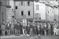  ?? AP ?? Residents of Eguilles, France, gather for a moment of silence Monday in remembranc­e of the two women who were fatally stabbed outside a train station in Marseille.