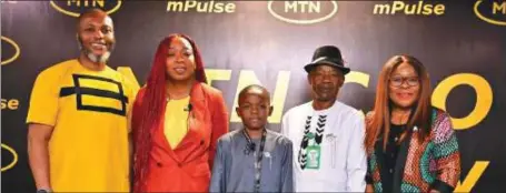  ?? ?? L- R: Chief Financial, MTN Nigeria, Modupe Kadiri; father of one-day CEO, Mr. Victor Nkanu, MTN Nigeria’s one day CEO, Daniel Victor Nkanu; Chief Marketing Officer, Adia Sowho; and Chief Human Resources Officer, Esther Akinnukawe, at the one-day CEO event, at the MTN Headquarte­rs, Lagos... recently