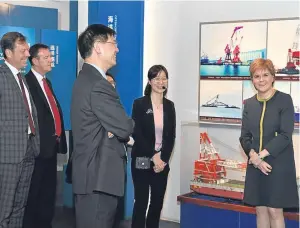  ?? Picture: Scottish Enterprise. ?? First Minister Nicola Sturgeon with representa­tives of COES in Shanghai.