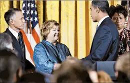  ?? MANUEL BALCE CENETA/AP 2009 ?? President Barack Obama greets the parents of Matthew Shepard, Dennis and Judy, during a reception commemorat­ing the Matthew Shepard and James Byrd Jr. Hate Crimes Act.