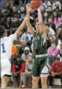  ?? GENE WALSH — DIGITAL FIRST MEDIA ?? Methacton’s David Duda squares to shoot as Norristown’s Vernon Tubbs defends Friday.