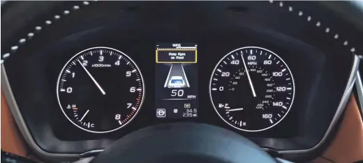  ??  ?? The driver attention monitor in the 2020 Subaru Legacy displays this warning when it detects the driver is not paying attention to the road. Automakers and technology companies are coming out with features aimed at reducing injuries and deaths related to distracted driving.