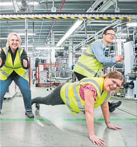  ?? Picture Andrew Cawley ?? Connor Keane, Izabela Kirszke, Jan Buntin and Andrew MacFarlane of ACS Clothing work out in the company’s factory at Eurocentra­l near Motherwell