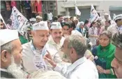  ?? PIC/MPOST ?? AAP leaders, including Deputy CM Manish Sisodia, organised padayatras and door-to-door campaign and met several residents