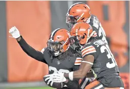  ?? David Richard, The Associated Press ?? Browns safety Sheldrick Redwine celebrates an intercepti­on in the second half Sunday against the Colts in Cleveland.