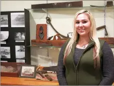  ?? Photo by Susan Holland ?? Randi Van Noy posed beside a display of antique carpenter’s tools and farm implements, one of the exhibits in the Gravette historical museum annex building. Van Noy is the new museum curator and is busy lining up exhibitors for the “My Collection­s”...