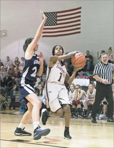  ??  ?? Chattanoog­a Valley’s Asia Silmon drives the lane against Gordon Lee’s Emma Langston. (Photo by Bambara Aven/www.bbaven.com) Ringgold girls 40, Trion 17 Gordon Lee girls 45, Chatt. Valley 23