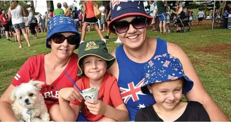  ?? PHOTO: BEV LACEY ?? AUSSIES: Baxter the dog with (from left) Margaret, Ben, 7, Kristy and Bella, 6, Taylor-Rose at Australia Day celebratio­ns at Picnic Point in 2017.