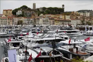  ?? (Photo Patrice Lapoirie) ?? Malgré la pluie, le Yachting Festival a exposé de nombreux yachts.