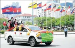  ?? SUPPLIED ?? An entourage of vehicles moves around the capital on August 2 in commemorat­ion of the athletes who returned home with gold medals from the World Police & Fire Games.