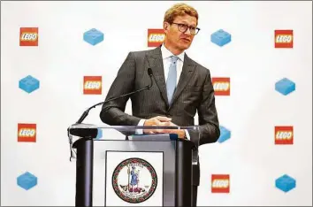  ?? Shaban Athuman / Associated Press ?? Lego Group CEO Niels Christians­en speaks during a news conference at the Science Museum of Virginia, on Wednesday in Richmond, Va. The Danish toy company said Wednesday it plans to invest more than $1 billion over 10 years to build a new factory in Virginia and to enlarge an existing factory in Mexico.