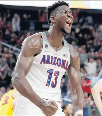  ?? Isaac Brekken Associated Press ?? DEANDRE AYTON made a lot of noise as a freshman at Arizona and, like most people in the basketball world, believes the Phoenix Suns will select him with the first pick in the NBA draft on Thursday.