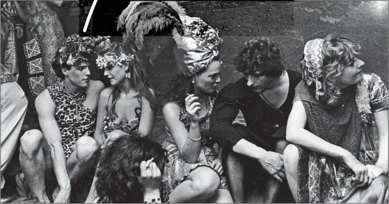  ??  ?? ANIMAL MAGNETISM: Hugh Grant, in leopard-print outfit, with friends including artist and milliner Marina Killery and designer Lulu Guinness at a ball in 1983