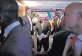  ?? Jonathan Ernst ?? The Associated Press Secretary of State Rex Tillerson, center, and Ethiopia’s Minister of Foreign Affairs Workneh Gebeyehu, right, depart after a news conference following their meeting Thursday in Addis Ababa, Ethiopia.