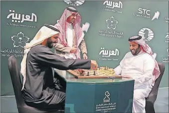  ?? [SAUDI PRESS AGENCY] ?? Two Saudi officials play during the opening of the first-ever chess tournament in Riyadh. Nearly two years ago, the country’s top cleric issued a religious edict against playing the game, but times have changed.