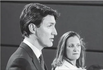  ?? PATRICK DOYLE THE CANADIAN PRESS ?? Prime Minister Justin Trudeau and Foreign Affairs Minister Chrystia Freeland announce that Liberals are imposing counter tariffs to equal the $16.6 billion imposed by the U.S.