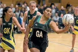  ?? ALDEN WILLIAMS/FAIRFAX NZ ?? Julianna Naoupu’s Kereru side crushed Halswell 72-30 in Christchur­ch premier netball on Tuesday night.