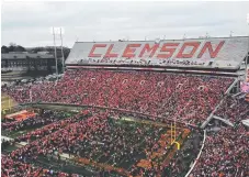  ??  ?? Clemson University wins a national championsh­ip.