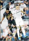  ?? (AP) ?? Los Angeles FC forward Latif Blessing, (left), and Real Salt Lake forward Bobby Wood try to head the ball during the second half of a Major League Soccer match, in Los Angeles. LAFC won 2-1.