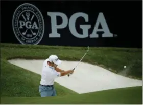  ?? CHARLIE RIEDEL — THE ASSOCIATED PRESS ?? Patrick Cantlay hits onto the 6th green as he practices for the PGA Championsh­ip golf tournament Monday at Bellerive in St. Louis.