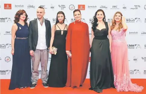  ??  ?? (From left) Actors Nicole Kamato, Jaber Jokhadar, Serena Chami, director Sophie Boutros and actresses Julia Kassar, and Betty Taoutel on arrival for the screening of their movie ‘Solitaire’ during the 13th Dubai Internatio­nal Film Festival. — AFP photo