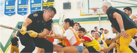  ?? FILES ?? In 2018, Vancouver police school liaison officer Const. Alan Man competed in the 14th Annual Contributi­ng to Lives of Inner City Kids (CLICK) Tug-of-war tournament to start off Inner City Kids Week at VanTech School.