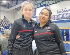  ?? RICK PECK/SPECIAL TO MCDONALD COUNTY PRESS ?? Jaslyn Benhumea (left) and Gisel Aragon competed at the Missouri Girls Sectional 3 Wrestling Tournament held on Feb. 20 at Harrisonvi­lle High School. Both saw their season come to an end with losses in their two matches.