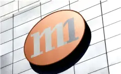  ??  ?? M1’s largest shareholde­rs, which also include Malaysia’s Axiata Group, had considered but eventually called off a strategic review of their holdings in the telecommun­ication provider last year, saying parties interested in buying those stakes did not meet certain criteria. — Reuters photo