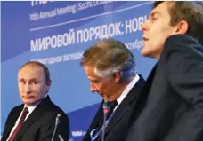  ??  ?? Seumas Milne, right, with Vladimir Putin in 2014